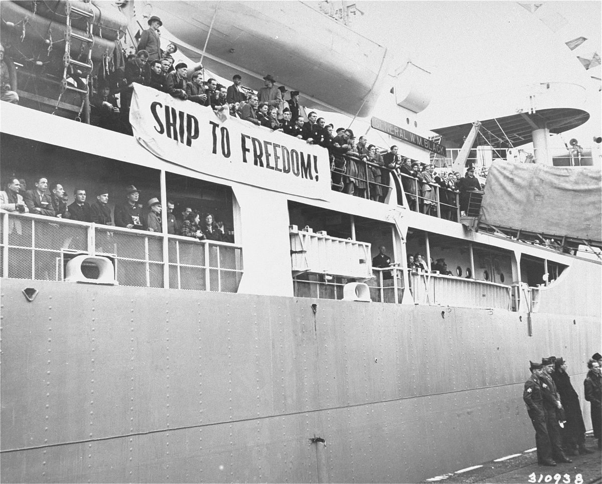 “Ship to Freedom!” The General W. M. Black leaving Bremerhaven in October 1948 on the first DP sailing to America, with its nameboard above the banner. Elmar Os
