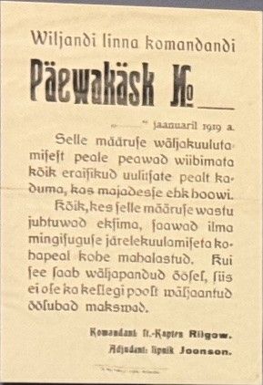 A curfew order printed in January 1919 with the date left blank, to be posted if the town was attacked: anyone found in the streets “will be shot on the spot”. 