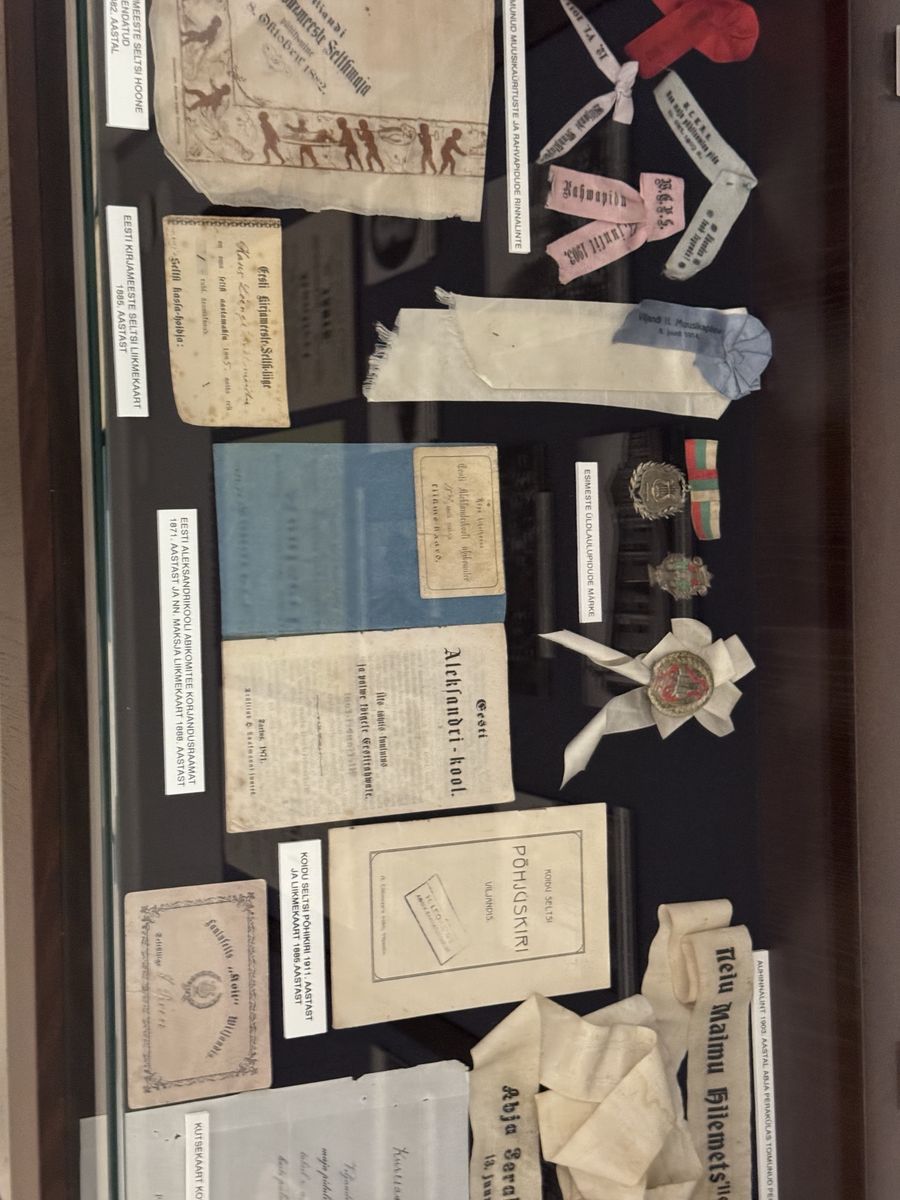 Viljandi Museum display, set 3 no. 9: Display case: Literati Society card 1885 and Alexander School card